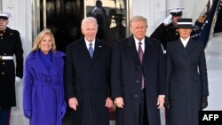 U.S. President Joe Biden and first lady Jill Biden pose alongside President-elect Donald Trump and Melania Trump as they arrive at the White House on Jan. 20, 2025, before departing for the U.S. Capitol where Trump will be sworn in as the 47th US President.