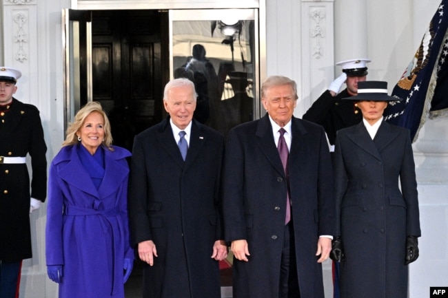 President Joe Biden and first lady Jill Biden pose alongside President-elect Donald Trump and Melania Trump as they arrive at the White House on Jan. 20, 2025, before departing for the US Capitol where Trump will be sworn in as the 47th U.S. President.