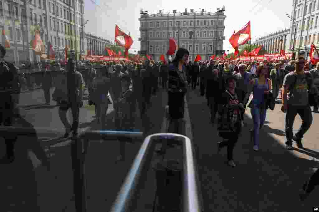 Thousands of Communists march during a May Day demonstration in Red Square in downtown Moscow, May 1, 2014.