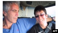 (FILES) This undated trial evidence image obtained December 8, 2021, from the US District Court for the Southern District of New York shows British socialite Ghislaine Maxwell and US financier Jeffrey Epstein.