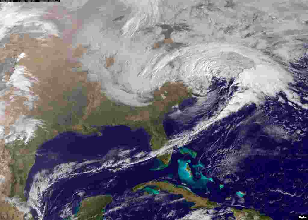 The winter storm system is seen over the eastern United States in this March 6, 2013 satellite image courtesy of NASA. 