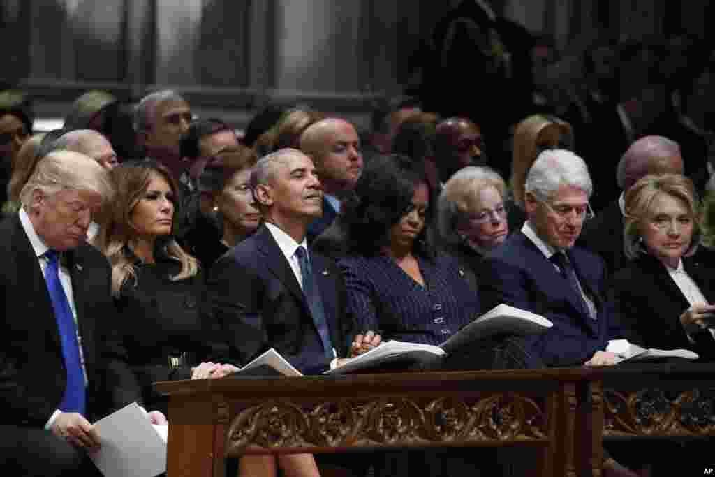 (L-R) President Donald Trump, first lady Melania Trump, former President Barack Obama, Michelle Obama, former President Bill Clinton and former Secretary of State Hillary Clinton listen during a State Funeral for former President George H.W. Bush at the National Cathedral in Washington, Dec. 5, 2018.