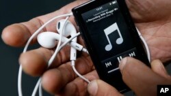 Many young people risk hearing loss as the result of loud music on portable devices. (AP File Photo/Kirsty Wigglesworth)