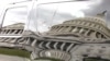 The U.S. Capitol is reflected in an SUV parked outside the Capitol in Washington, September 28, 2013.