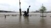 Midwest Flooding Leads to Evacuations; Road, School Closings