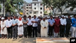 Bangladeshi Muslims attend the funeral of Xulhaz Mannan, who was stabbed to death by unidentified assailants, in Dhaka, Bangladesh, April 26, 2016.