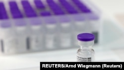 Switzerland, Lucerne, Vials of Pfizer vaccine against the coronavirus disease (COVID-19) are seen at the Messe Luzern fairground's vaccination center in Lucerne, Switzerland December 23, 2020. (REUTERS/Arnd Wiegmann)