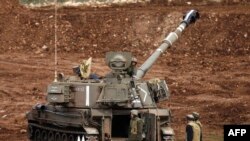 Một khẩu trọng pháo di động của Israel được bố trí gần biên giới với Syria trong vùng Cao Nguyên Golan Israel chiếm đóng, 27/1/15