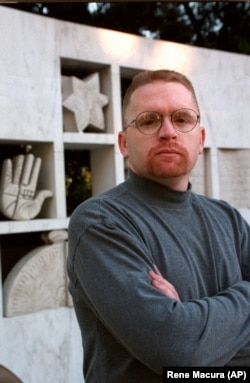 Tom "T.J." Leyden is seen in front of the Wall of Remembrance at the Simon Weisenthal Museum of Tolerance in Los Angeles, Tuesday, Dec. 9, 1997. In the early 1980s Leyden was a founder-recruiter for one of California's deadliest skinhead groups.
