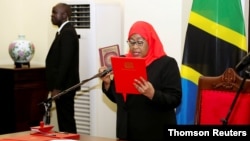 Tanzania's new President Samia Suluhu Hassan takes oath of office March 19, 2021, following the death of her predecessor John Pombe Magufuli, at State House in Dar es Salaam.