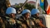FILE - U.N. peacekeepers wait to escort members of the U.N. Security Council as they arrive at the airport in Juba, South Sudan, Sept. 2, 2016. One South Sudanese lawmaker says a regional protection force will need to be better armed than the current peacekeeping force in the country.