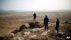 Malian troops man an observation post outside Sevare, Mali January 24, 2013. 