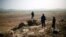 Malian troops man an observation post outside Sevare, Mali January 24, 2013. 