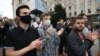 People applaud during a protest rally against the removal of opposition candidates from the presidential elections in Minsk, Belarus, July 14, 2020.