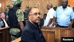 FILE - Mozambique's former finance minister Manuel Chang appears in court during an extradition hearing in Johannesburg, South Africa, Jan. 8, 2019. 