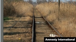 Many Migrants, refugees and asylum seekers follow railroad tracks when they reach the Balkan countries because they lead to towns and cities. Amnesty International says at least 30 have been killed by passing trains over recent months. (Credit: Amnesty International)