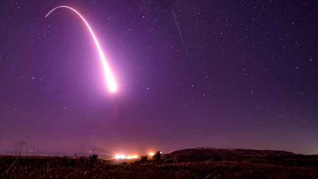 FILE - This image taken with a slow shutter speed shows an unarmed Minuteman 3 intercontinental ballistic missile test launch at Vandenberg Air Force Base, California, Oct. 2, 2019.