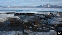 In this photo provided by Morten Rasch on Saturday, Aug. 28, 2021, a view of the newly discovered Island, off the coast of Greenland. A team of Arctic researchers from Denmark has discovered accidentally during an expedition what they believe is the world’s northernmost island.