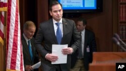 FILE - Sen. Marco Rubio (Republican-Florida) arrives for a news conference at the Capitol in Washington, March 7, 2018.