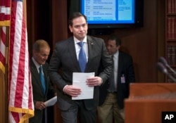 FILE - Sen. Marco Rubio (Republican-Florida) arrives for a news conference at the Capitol in Washington, March 7, 2018.