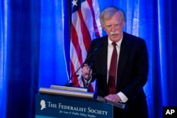 National Security Adviser John Bolton speaks at a Federalist Society luncheon at the Mayflower Hotel in Washington, Sept. 10, 2018.