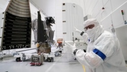 Principal Investigator for NASA's Lucy spacecraft, Hal Levison, speaks with a reporter at the AstroTech facility Wednesday, Sept. 29, 2021, in Titusville, Fla. (AP Photo/John Raoux)