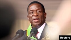 FILE: Emmerson Mnangagwa speaks after being sworn in as Zimbabwe's president in Harare, Zimbabwe, Nov. 24, 2017. 