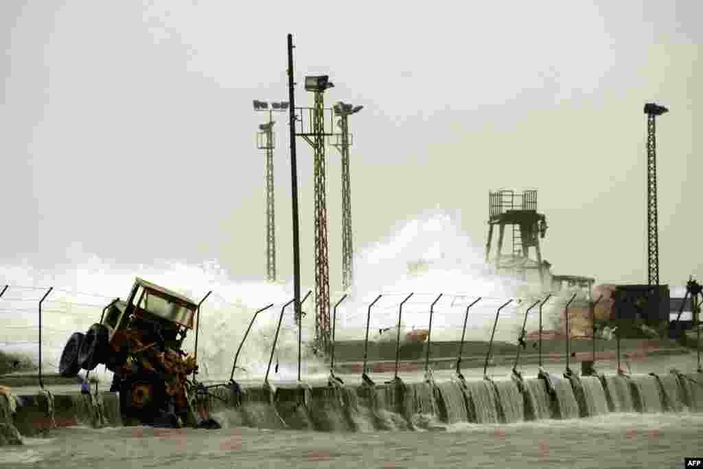 Waves crash onto the shore of the southern Lebanese city of Sidon. Stormy weather, including high winds and heavy rainfall, lashed the eastern Mediterranean coast, downing power lines and trees and causing several injuries in a number of countries.