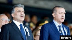 FILE - Turkey's President Abdullah Gul (L) is pictured with Prime Minister Recep Tayyip Erdogan.