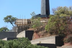 FILE: Construction of a mausoleum where former Zimbabwean President Robert Mugabe was supposed to be buried continues at the National Heroes Acre, in Harare, Friday, Sept, 27, 2019.