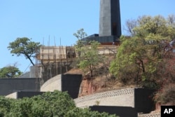 Construction of a mausoleum where former Zimbabwean President Robert Mugabe was supposed to be buried continues at the National Heroes Acre, in Harare, Friday, Sept, 27, 2019.