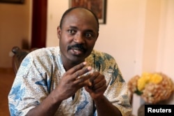 FILE - Journalist Rafael Marques de Morais is interviewed at his home in Luanda, Angola, May 12, 2015.