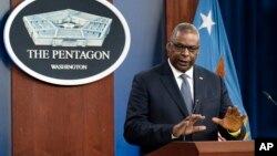 FILE - U.S. Secretary of Defense Lloyd Austin speaks during a media briefing at the Pentagon, Nov. 17, 2021, in Arlington, Virginia.