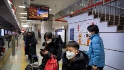 Pasajeros con máscaras en el metro de Beijing el 24 de enero de 2020.