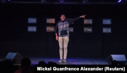 Kyle Hernandez recites a poem during "True Talk No Lie", a monthly spoken word event in Port of Spain, Trinidad and Tobago, May 23, 2018.