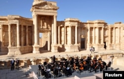 Russia's Mariinsky Theatre performs at the amphitheatre of the Syrian city of Palmyra, Syria in this handout picture provided by SANA, May 5, 2016.