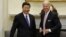 FILE - Joe Biden and China's Xi Jinping are pictured in the Roosevelt Room at the White House in Washington, Feb. 14, 2012, when each was his nation's vice president.