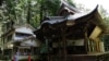 Buddhist monk Benmou Suzuki looks at the Mikaboyama Fudoson temple in Fujioka, Gunma prefecture, Japan, Sept. 4, 2024.