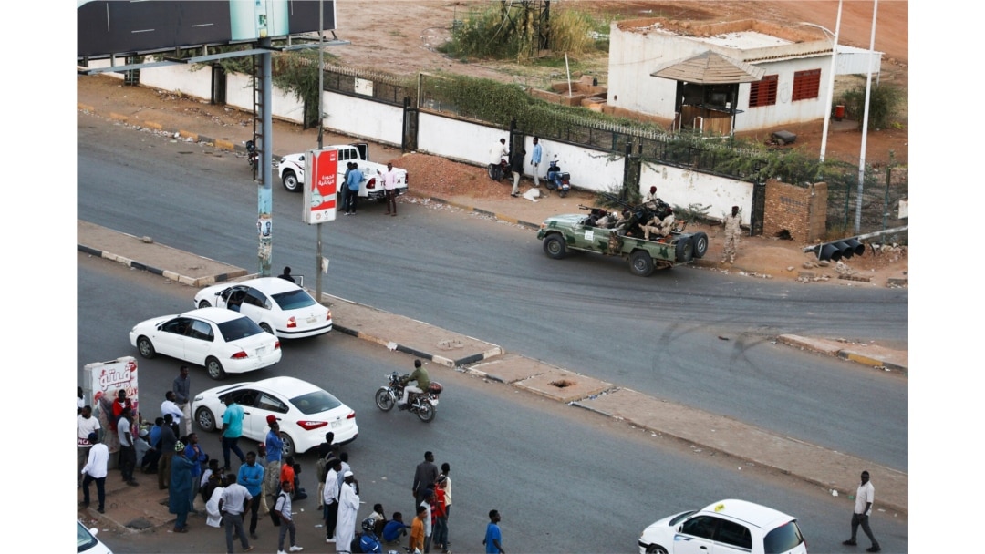 Members of the Rapid Support Forces, a paramilitary force operated by the Sudanese government, block roads in Khartoum, Sudan, Jan. 14, 2020.