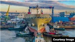 한화오션그룹이 펜실베이니아주 필라델피아에 위치한 최첨단 시설인 필리 조선소에 대형 선박이 건조 중 정박해 있다. = 한화 오션 그룹 제공
