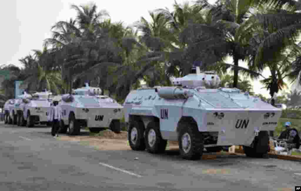 UN armored personnel carriers (APC) park near the Gulf Hotel in Abidjan, 18 Dec 2010