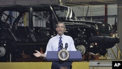 President Barack Obama speaks at Chrysler Group's Toledo Assembly complex in front of a Jeep Wrangler, in Toledo, Ohio, June 3, 2011