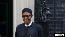 Shugaban Najeriya yayin wata ziyara da ya kai Burtaniya. 