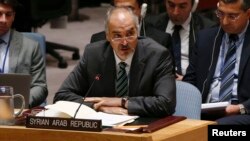 FILE - Syrian Ambassador to the U.N. Bashar Ja'afari speaks during a United Nations Security Council meeting at U.N. headquarters in New York, Sept. 19, 2014.