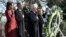 President Barack Obama (2nd L), first lady Michelle Obama (L), former President Bill Clinton (3rd L) and Hillary Clinton participate in a wreath-laying in honor of assassinated U.S. President John F. Kennedy at Arlington National Cemetery, near Washington D.C., Nov. 20, 2013.