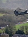 FILE - A Chinook near Salisbury Plain in Wiltshire, Britain, where Australian Armed Forces were supporting the U.K.-led training of Ukrainian recruits on Feb. 1, 2023.