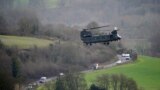 FILE - A Chinook near Salisbury Plain in Wiltshire, Britain, where Australian Armed Forces were supporting the U.K.-led training of Ukrainian recruits on Feb. 1, 2023.