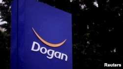 FILE - The logo of Dogan Holding is pictured at its headquarters in Istanbul, Turkey, January 5, 2017.