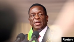 FILE: Emmerson Mnangagwa speaks after being sworn in as Zimbabwe's president in Harare, Zimbabwe, Nov. 24, 2017. 