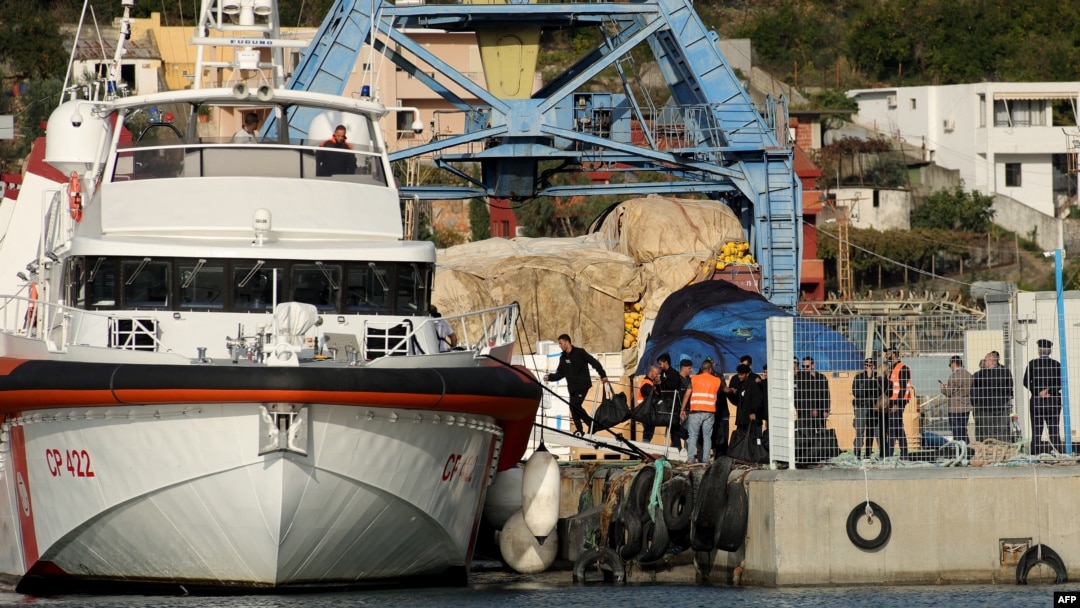A group of migrants embark on an Italian ship at Shengjin port in Albania on Oct. 19, 2024. The 12 migrants left Albania for Italy after judges ruled against their detention in the non-EU nation under a controversial deal between Rome and Tirana.